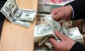 100 دولار تشعل أزمة جديدة بسوق النقد في لبنان