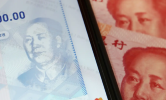 هل يهز "اليوان" الرقمي عرش العملات الدولية؟