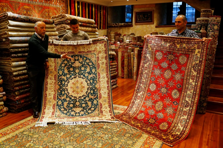 تقرير-من-السجاد-إلى-الألبسة-كي